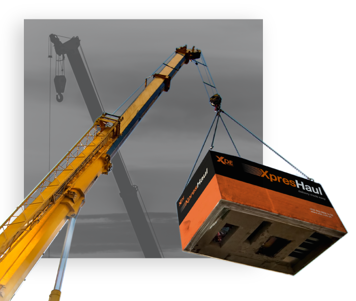 Heavy lift crane moving specialized XDE cargo